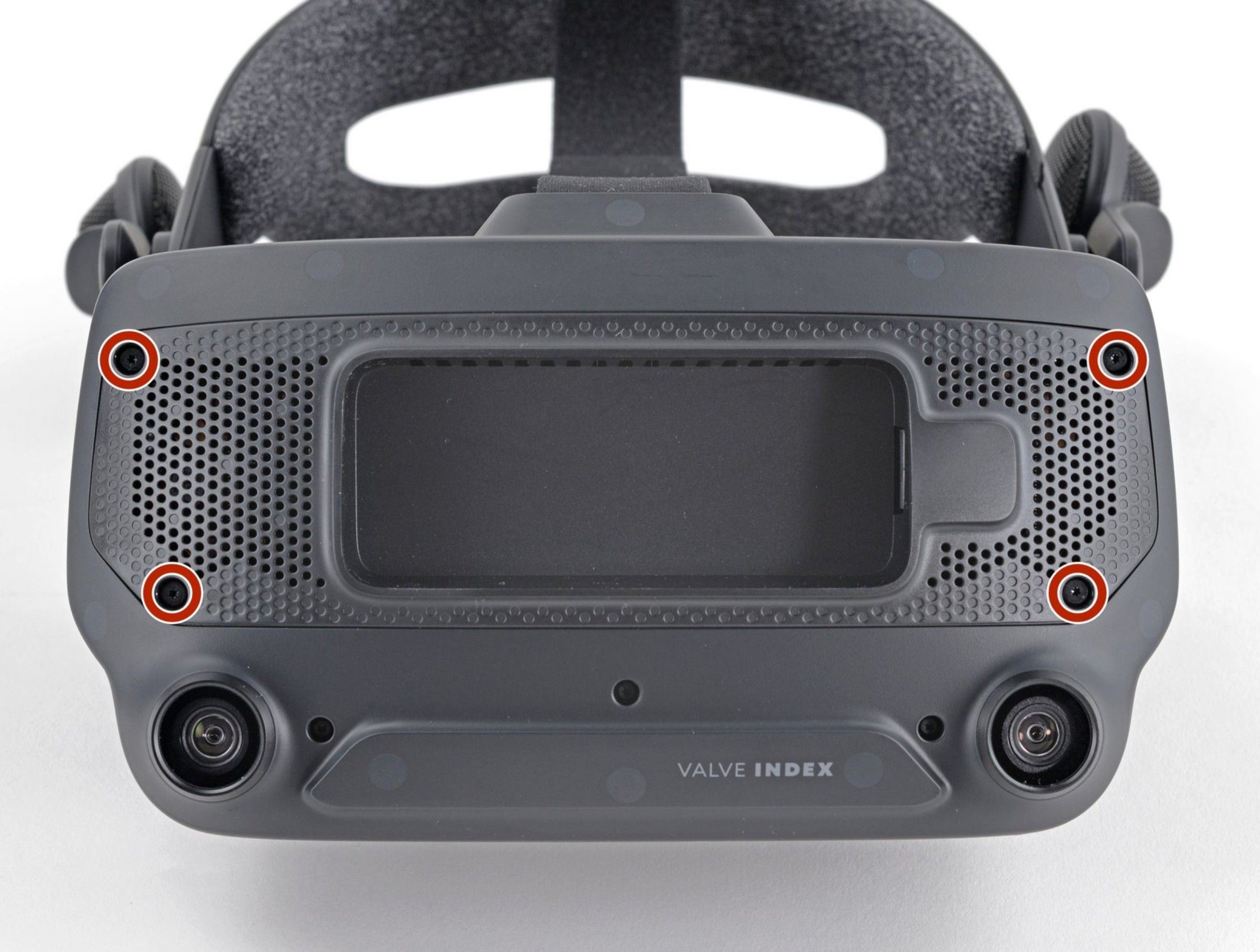 Keturi T5 Torx varžtai pažymėti ant pagrindinės plokštės dangtelio